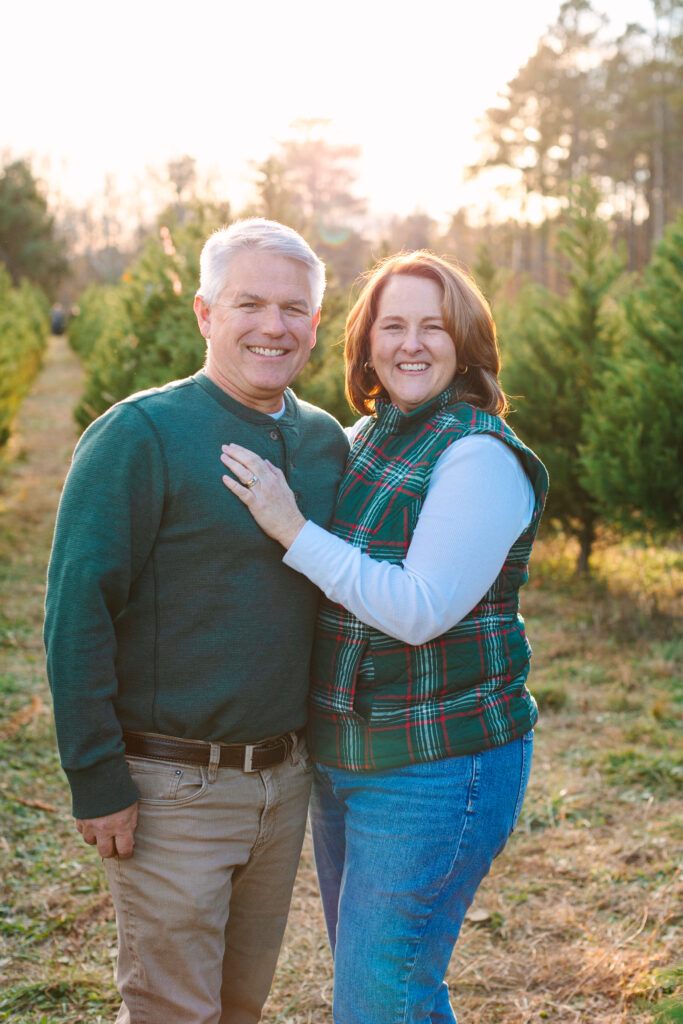 Coordinating couples outfits for Christmas Tree Farm Photos in Williamsburg Virginia