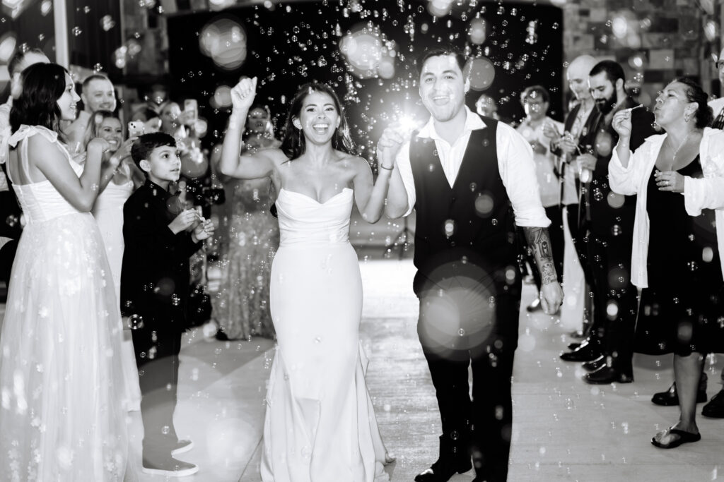 Newlyweds exiting their reception during a bubble send-off at The Maine of Williamsburg