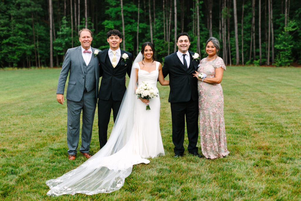 Family photos taken after the ceremony at The Maine of Williamsburg