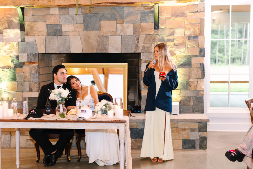 Maid of honor wedding toasts during the reception at The Maine of Williamsburg