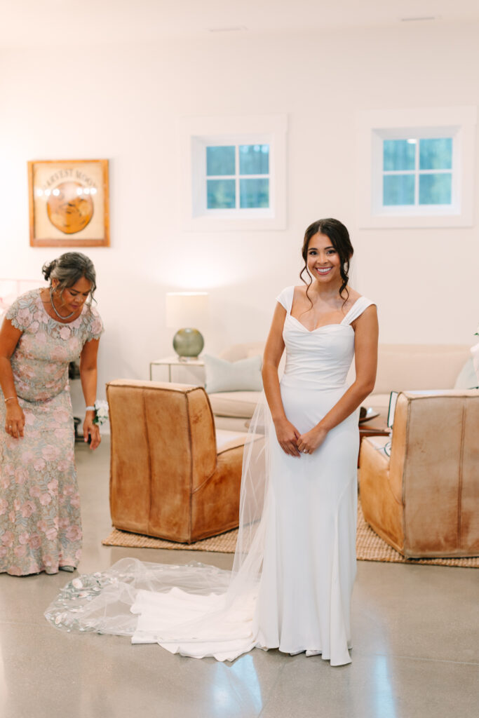 Bride getting ready with her mother at The Maine of Williamsburg