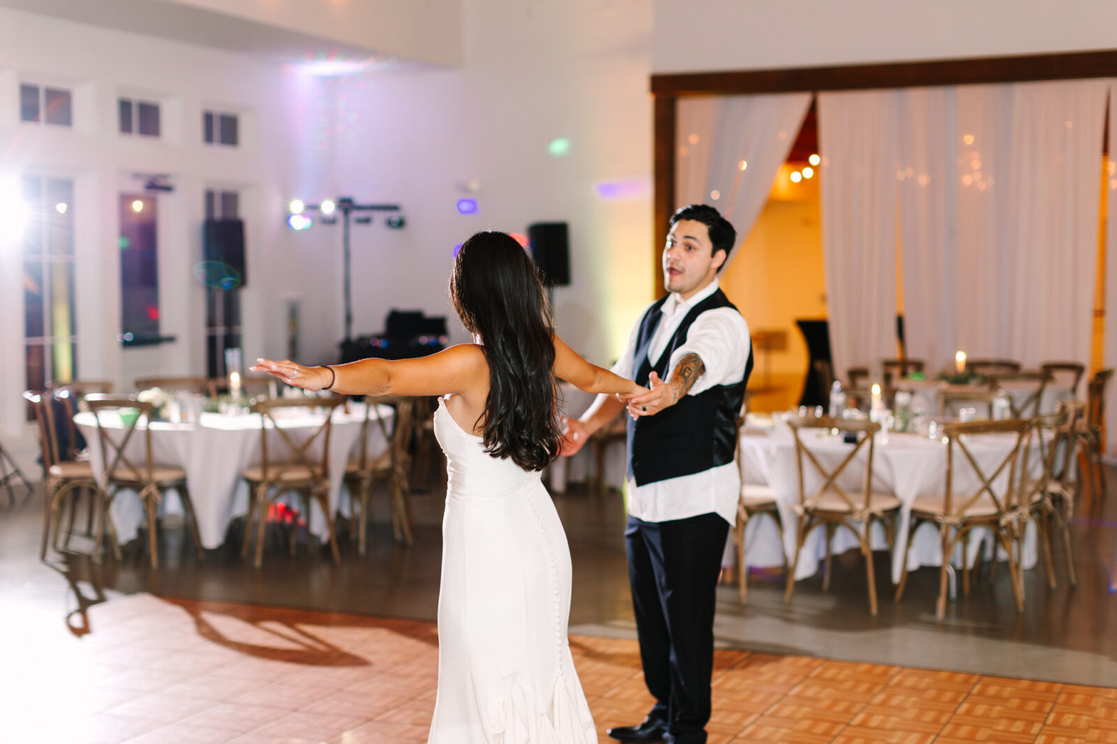Couple sharing a private last dance at The Maine of Williamsburg wedding reception